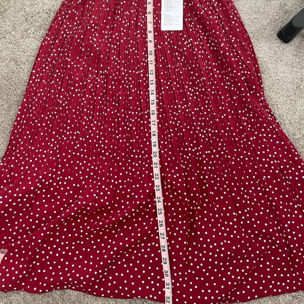 Long pleaded red polka dot skirt